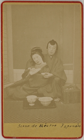 Photograph of a Japanese actress and actor in a theatrical scene.  Ca. 1875-80. 