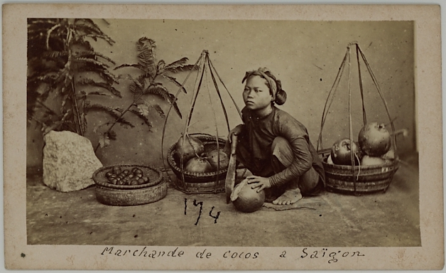 Photograph of a coconut seller from Saigon, Vietnam.  Ca. 1875-79. Cdv by Emile Gsell (1838-1879)